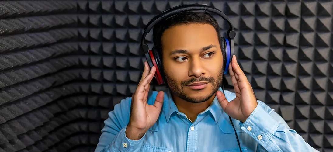 Patient de Martinique réalisant un audiogramme